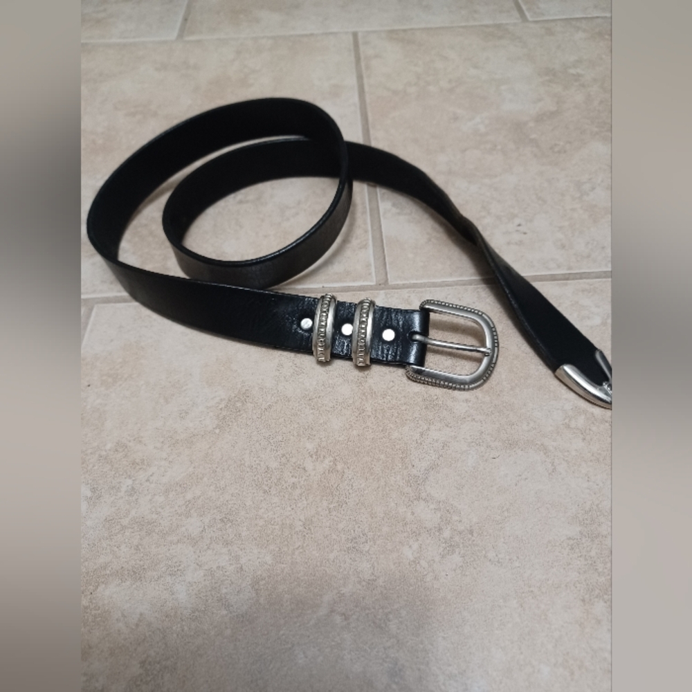 Johnny's Goods Sleek Black Leather Western Belt with Silver Buckle.